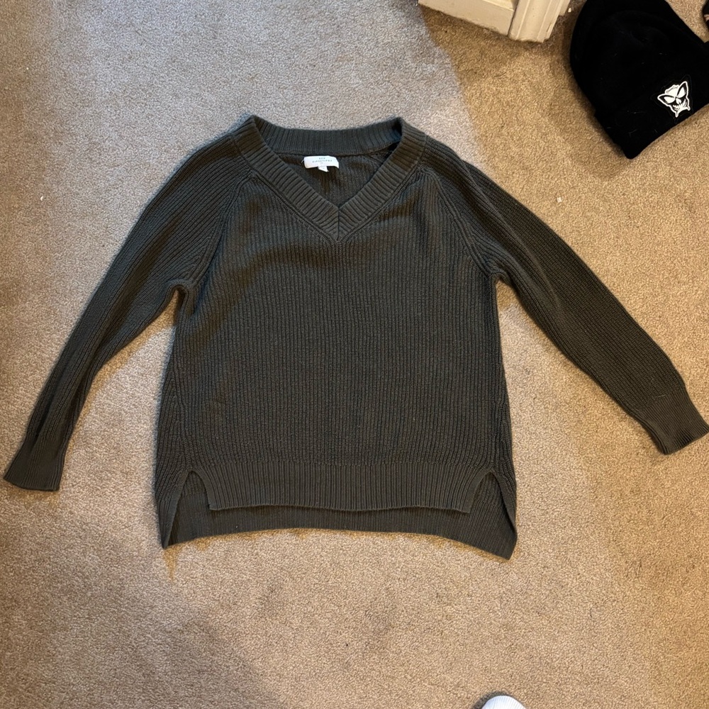 green sweater
